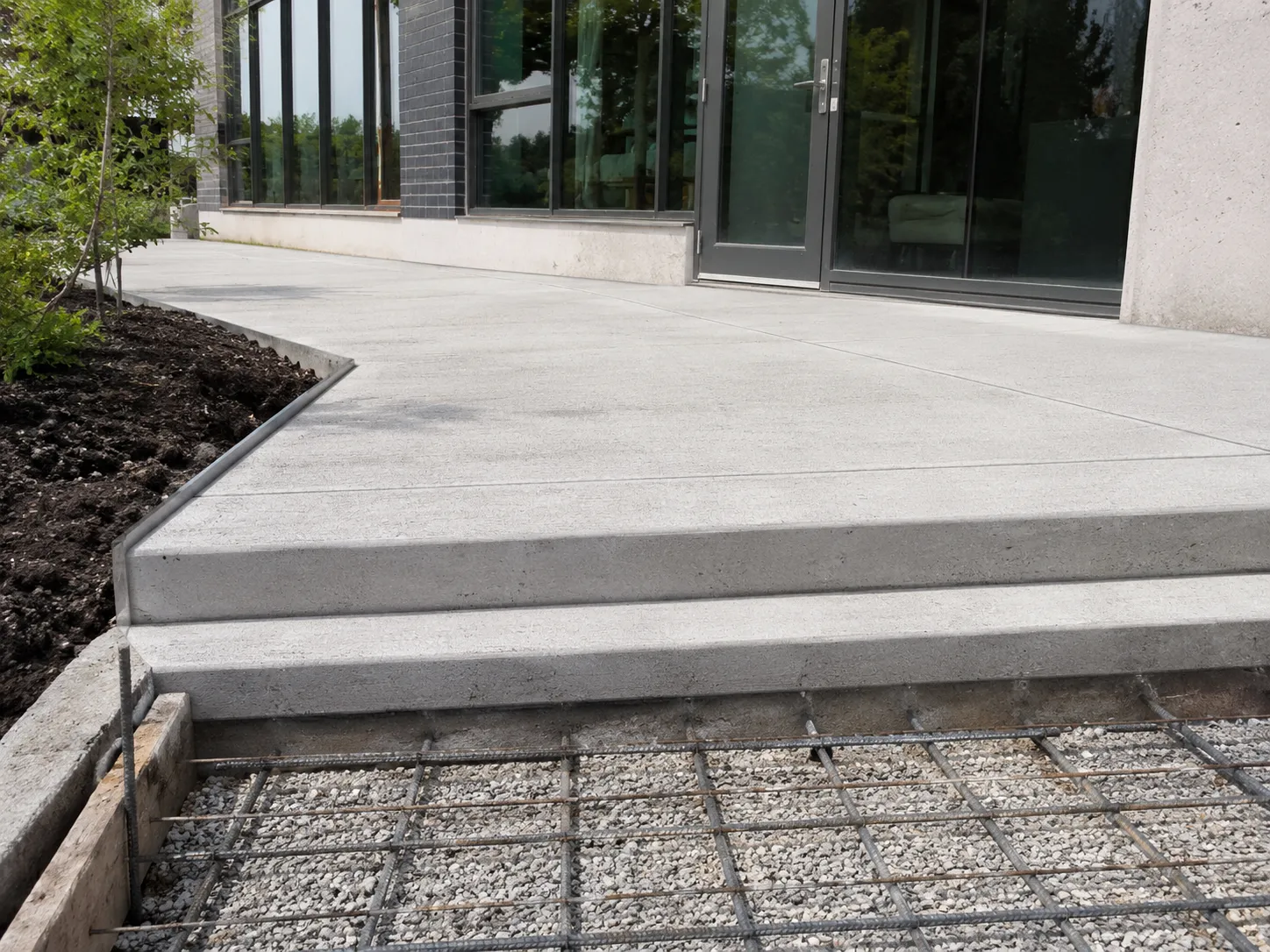 Completed Commercial Concrete Patios and Landings installation in Ajax by Harrowgate Group