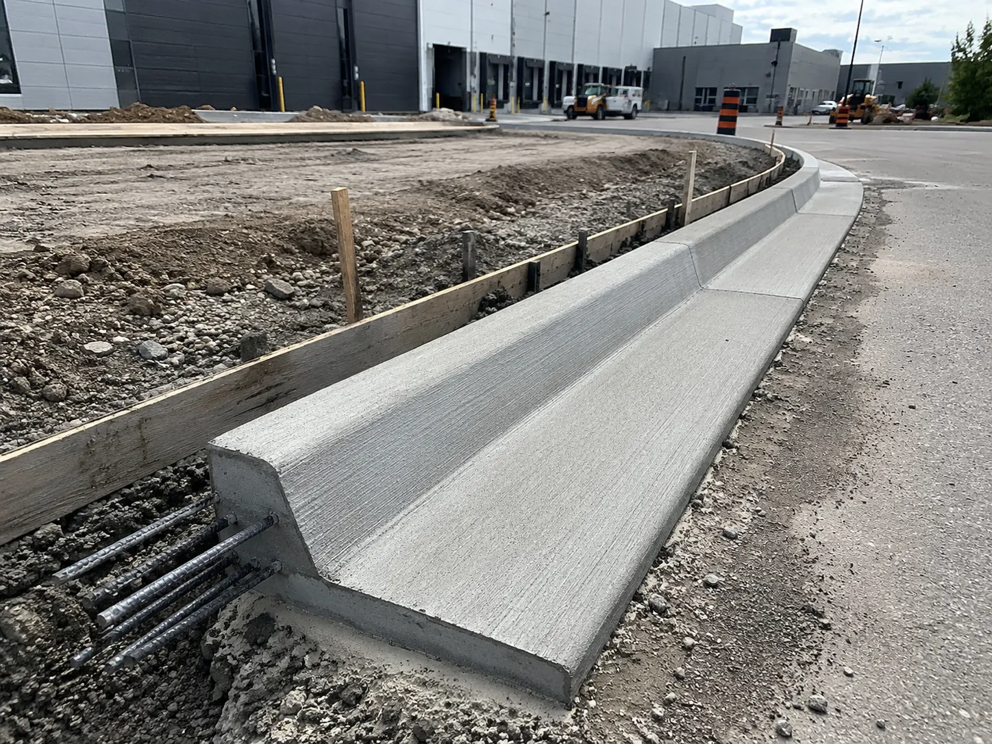 Completed Concrete Curbs and Gutters installation in Burlington by Harrowgate Group