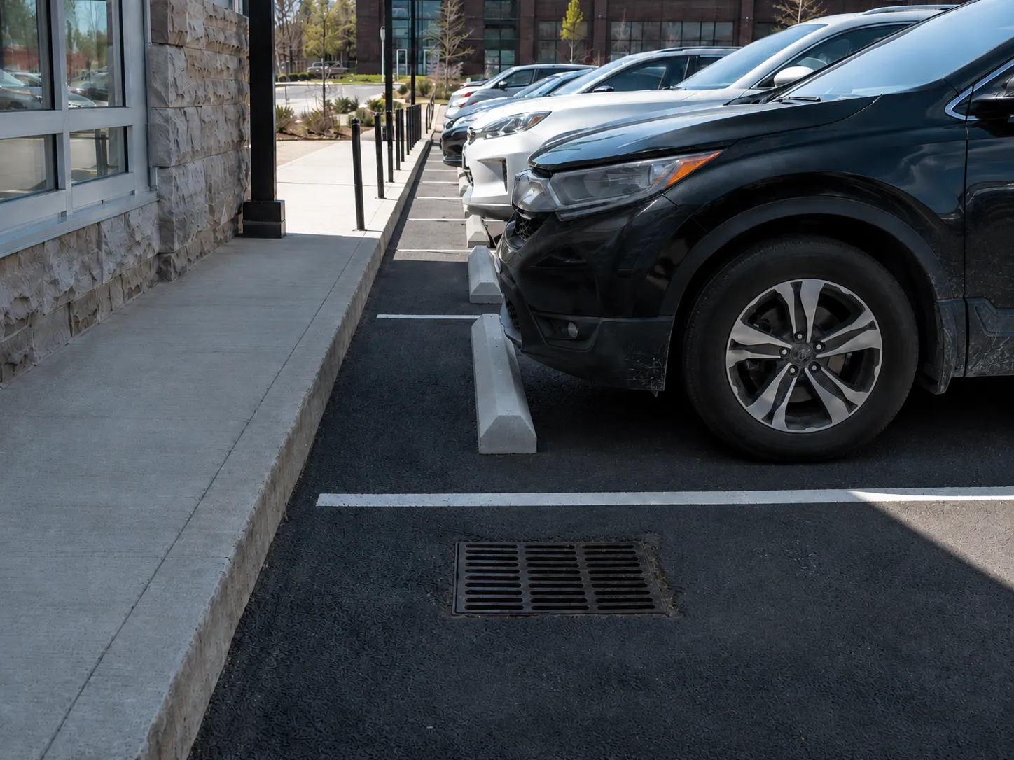 Completed Wheel Stops and Parking Curbs installation in Aurora by Harrowgate Group