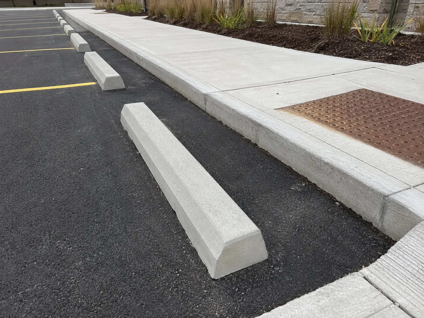 Wheel Stops and Parking Curbs being built and completed on site by Harrowgate Group